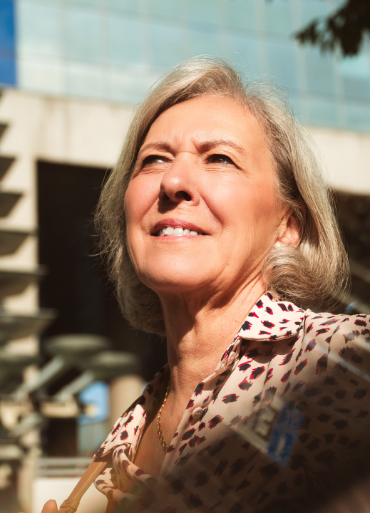 A close up of a person talking on a cell phone.